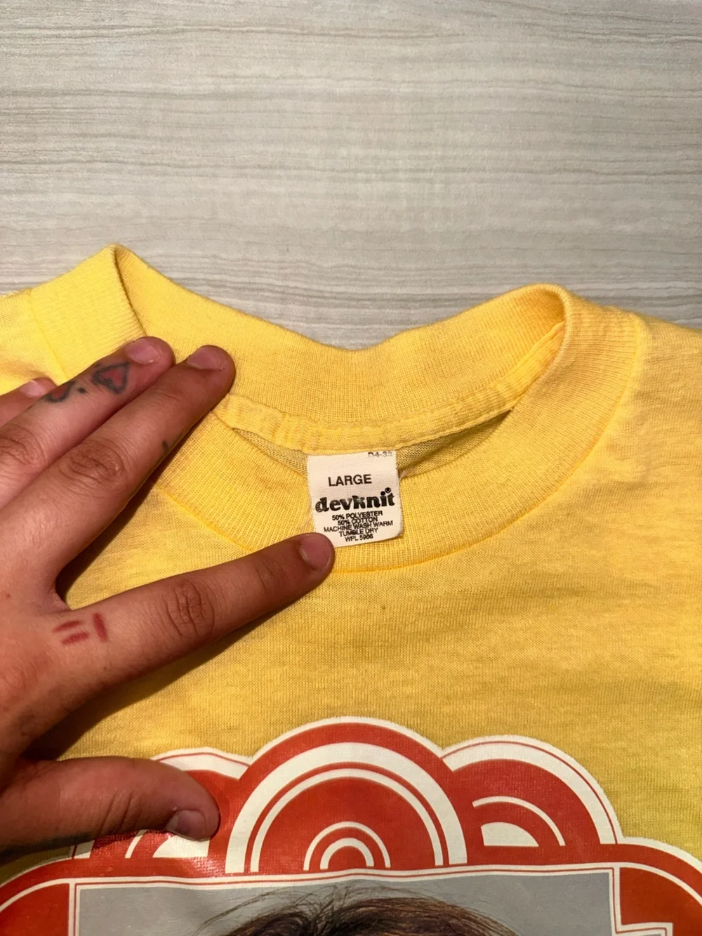 Deknit shirt featuring